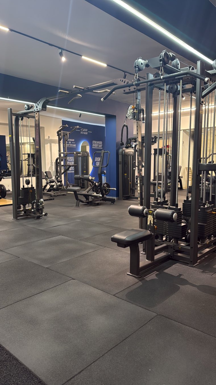 Cable machines and strength equipment on the gym floor